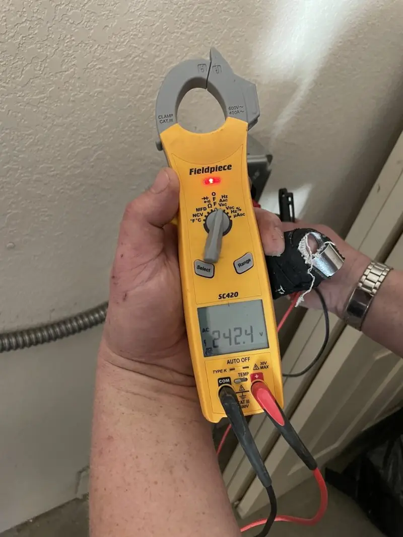 Voltage testing with clamp meter during Circuit Breaker Repair in South Hanover